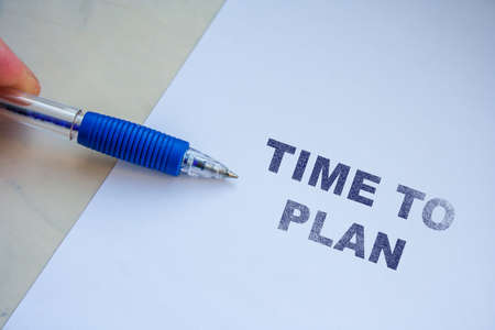Time to plan message on white paper note with pen. Analysis or vision conceptの写真素材