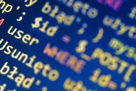 Software development pattern. Programmer monitor with php language code. Closeup tablet screen...