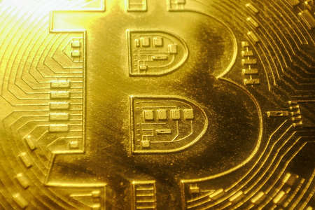 Gold bitcoin coin. Crypto currency symbol. Virtual money concept. Macro bitcoin cash
