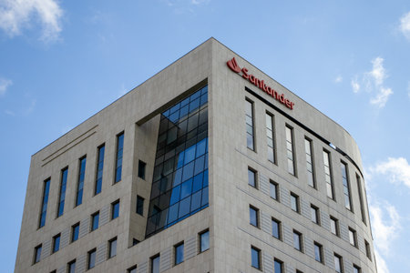 Warsaw Poland; October 2; 2022: Santander Bank logo. Building with bank logo in Warsaw.のeditorial素材