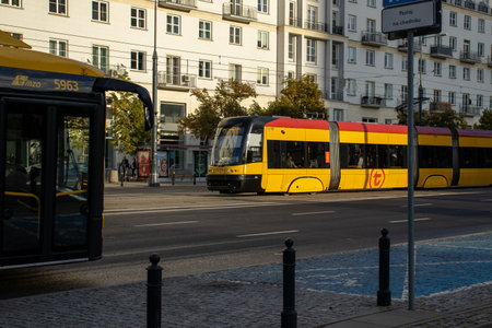 Warsaw Poland, October 2, 2022: Bi-directional tram, produced by Polish company Pesa in Warsaw. Trolleys on road in Warsaw city centerのeditorial素材