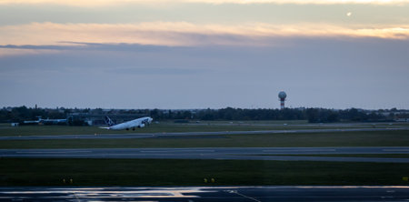 Warsaw, Frederic Chopin International Airport, Poland, October 2, 2022: LOT Polish Airlines plane taking off at the airport in Warsawのeditorial素材