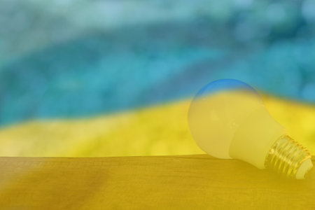Energy problem concept Ukraine Flag. Increased energy consumption in Ukraine. Energy crisis in Ukraine. Destruction of the electrical network. No electricityの写真素材