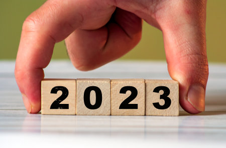 2023 change year concept. Cube block with 2023 inscription as start New Year 2023. start new business target strategy concept. Loading year conceptの写真素材