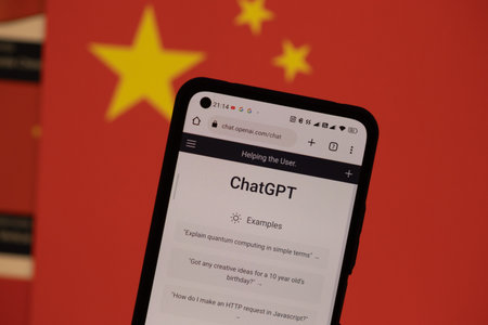 Warsaw Poland - February 24, 2023: ChatGPT chat bot on smartphone screen and China flag in background. OpenAI chat bot artifical intelligenceのeditorial素材