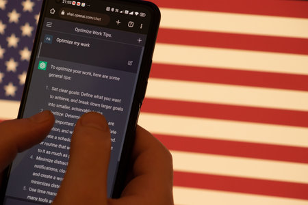 Warsaw Poland - February 24, 2023: prototype AI chatbot, seen on the website of OpenAI - smartphone. new wave of chatbots like ChatGPT use AI with USA flagのeditorial素材
