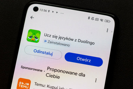 Warsaw Poland - September 24 2025: A smartphone screen displaying the Duolingo language learning app with vibrant colors and user interface elements.のeditorial素材