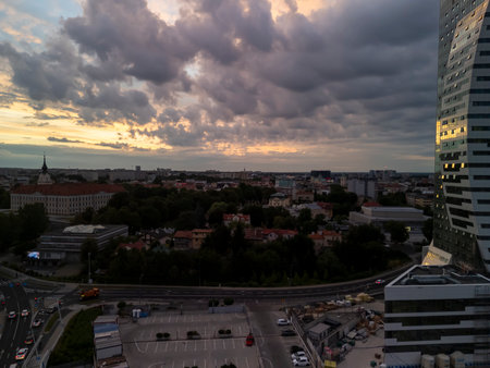 Rzeszow Poland - July 3 2024: Aerial view of Rzeszow with dramatic clouds at sunset showcasing urban development and architecture in the city skyline.のeditorial素材