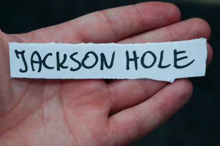 Handwritten note saying Jackson Hole held in a persons hand. This image captures the essence of travel adventure and exploration in Wyoming.の写真素材
