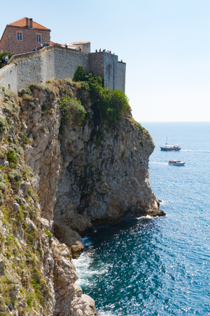 View of city wall along cliff in Dubrovnik, Croatiaのeditorial素材