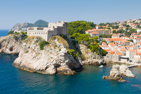 Walled fortress of Dubrovnik and rocky cliffの写真素材