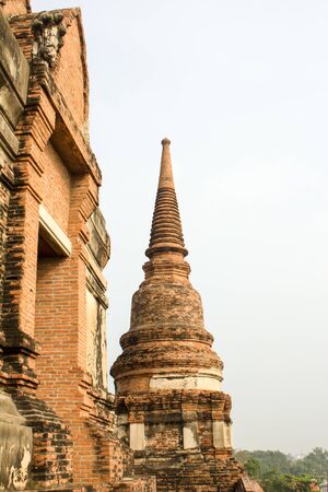 Pagoda and Buddha Status at Wat Yai Chaimongkol, Ayutthaya, Thailandの写真素材