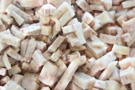 Group of taro roots with one cut in cross sectionsの写真素材