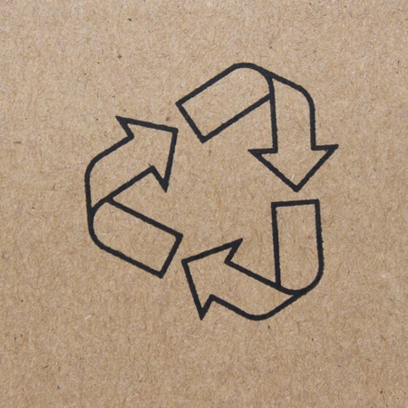 cardboard box background with recycle symbolの写真素材