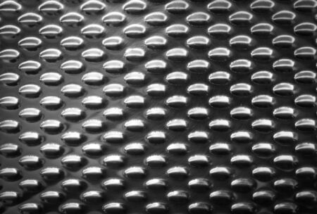 Industrial shiny metal silver list with rhombus shapes