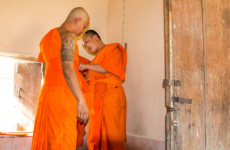 Phetchabun,THAILAND June 8 : Newly ordained Buddhist monk pray with priest procession. Newly ordained Buddhist monks have a ritual in the temple procession in Phetchabun Thailand on June 8, 2014のeditorial素材