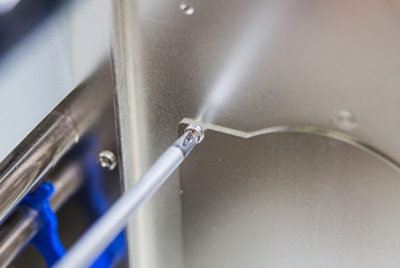 Technician servicing using screwdriver
