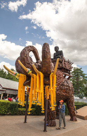 Lung Poh Toe Wat Huay Mong Kol Passing under the elephant for luck. Thailand,01 June 2015のeditorial素材