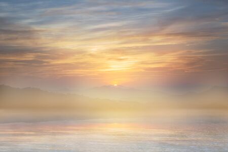 Colorful sunset on top of thailand mountain and lagoonの写真素材