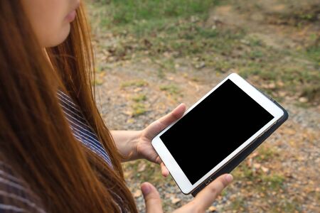 Woman Using a tablet.
