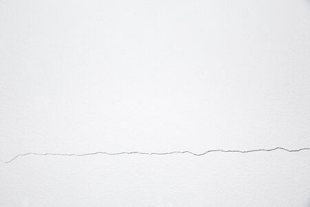 white cement wall background, crackの写真素材