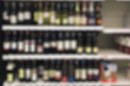 blur alcohol in supermarket shopping in derpartment store interior for backgroundの写真素材