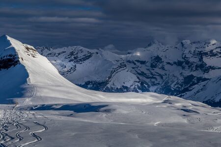 Free ski terrain, Alps in Flaine area, Grand Massif, France Painting skiers in powder snowの写真素材