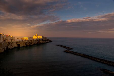 Vieste - beautiful coastal town on the rocks in Puglia. The church of San Francesco di Vieste. Gargano peninsula, Apulia, southern Italy, Europe.の写真素材