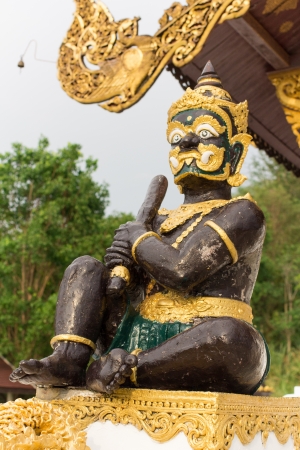 Giant Statues in Thai Temple の写真素材