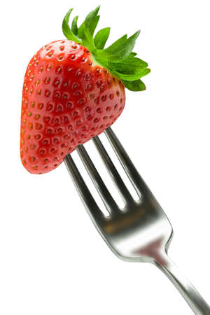 closeup of a forked stawberry with a bokeh backgroundの写真素材