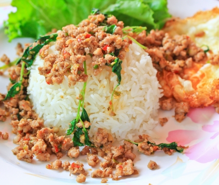 Thai food Thai spicy food, Fried pork with sweet basil whit basi の写真素材