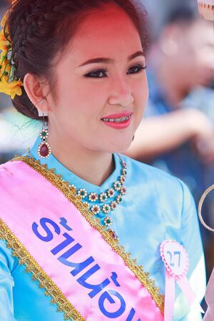 CHIANG MAI, THAILAND-JANUARY 19   30th anniversary Bosang umbrella festival,Woman in traditional costume during the annual Umbrella festival at San Kamphaeng  on Jan 19, 2013 in Chiang Mai, Thailand  のeditorial素材