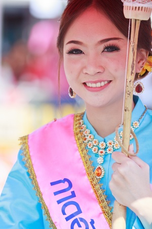 CHIANG MAI, THAILAND-JANUARY 19   30th anniversary Bosang umbrella festival,Woman in traditional costume during the annual Umbrella festival at San Kamphaeng  on Jan 19, 2013 in Chiang Mai, Thailand  のeditorial素材