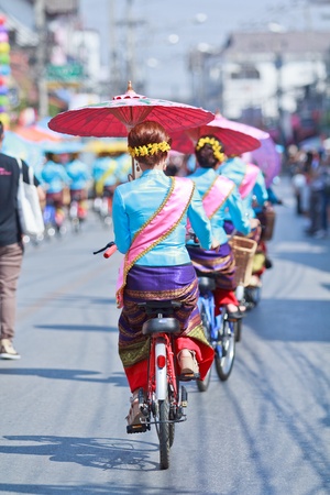 CHIANG MAI, THAILAND-JANUARY 19   30th anniversary Bosang umbrella festival,Woman in traditional costume during the annual Umbrella festival at San Kamphaeng  on Jan 19, 2013 in Chiang Mai, Thailand  のeditorial素材
