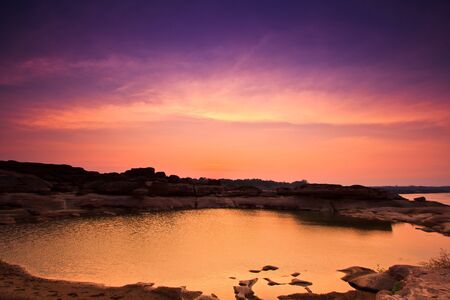 sunset rock holes  stone View Sam-Pan-Bok Grand Canyon in thailand の写真素材
