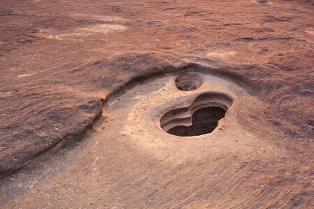 sunset rock holes  stone View Sam-Pan-Bok Grand Canyon in thailand の写真素材