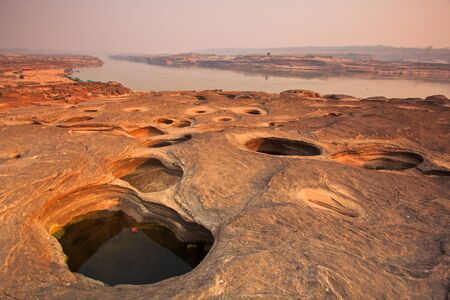sunset rock holes  stone View Sam-Pan-Bok Grand Canyon in thailand 