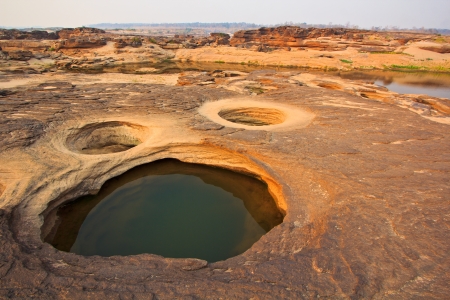 Rock holes Stone View Sam-Pan-Bok Grand Canyon in thailand の写真素材