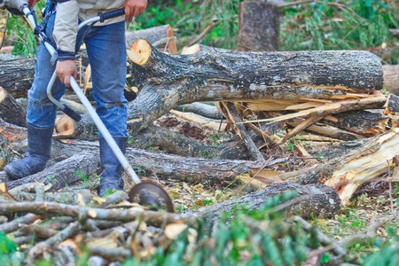 Man cutting piece of wood Cutting wood 