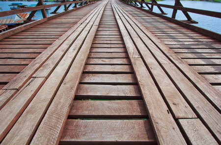 The old wooden bridge Bridge collapse Bridge across the river and Wood bridge  Mon bridge  at sangklaburi, kanchanaburi, Province Asia thailand の写真素材