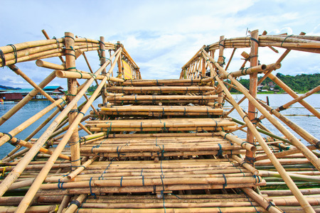 Bamboo bridge across the river in Sangkhlaburi kanchanaburi Province Asia Thailand の写真素材