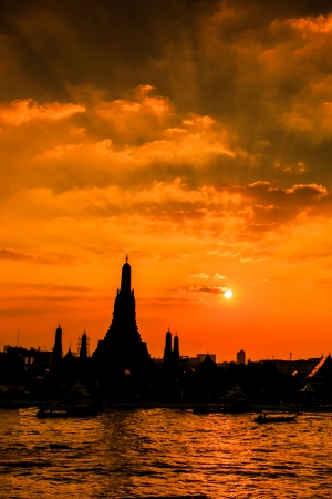 Wat Arun Temple sunset in bangkok asia Thailand の写真素材