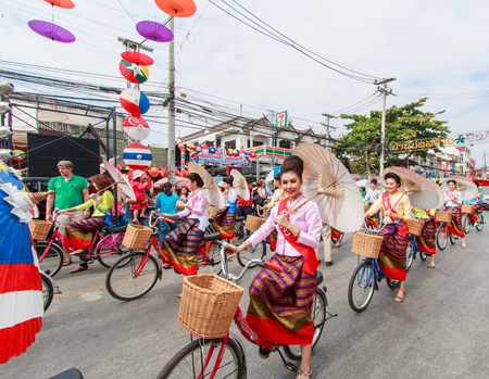 CHIANG MAI, THAILAND-JANUARY 19   31th anniversary Bosang umbrella festival,Women in traditional costume during the annual Umbrella festival at San Kampaeng  on Jan 19, 2014 in Chiang Mai, Thailandのeditorial素材