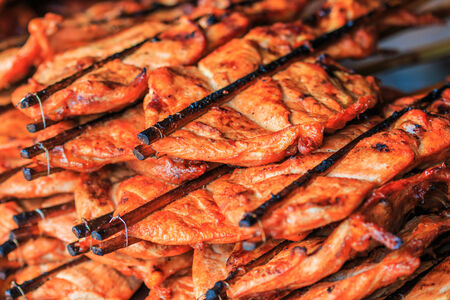 Grilled chicken Leg on the grillの写真素材