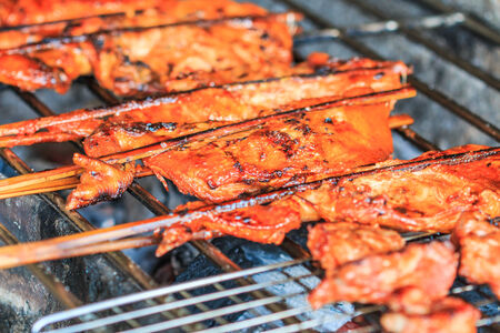 Grilled chicken Leg on the grillの写真素材