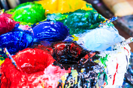 Old paints artists paintbrushes paints and brushes background