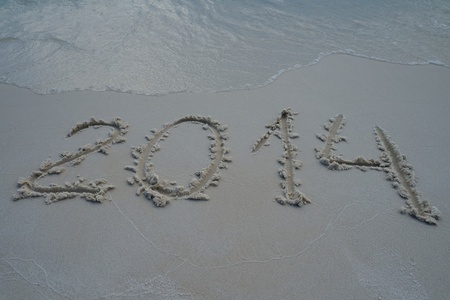 2014 year written on the sand beachの写真素材