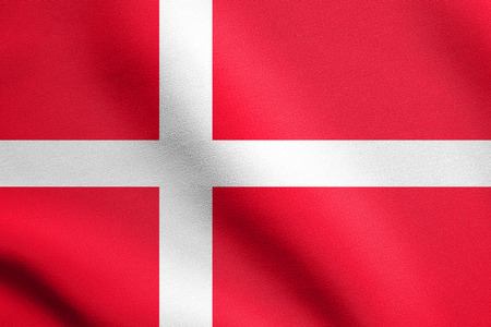 Flag of Denmark waving in the wind with detailed fabric texture. Danish national flag.の写真素材