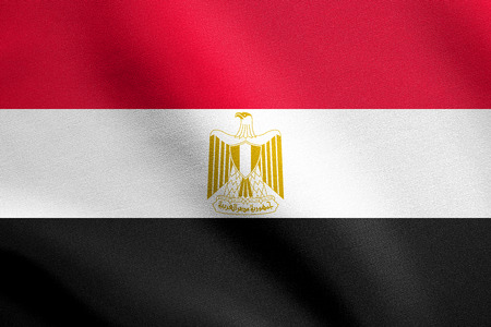 Egyptian national official flag. Arab Republic of Egypt patriotic symbol, banner, element, background. Flag of Egypt waving in the wind with detailed fabric textureの写真素材