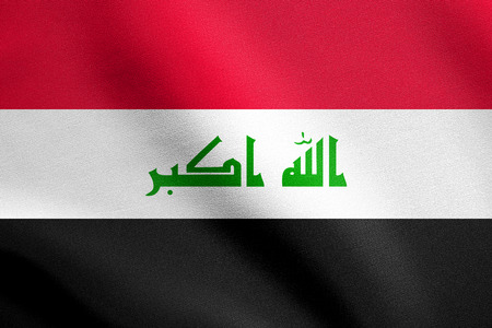 Iraqi national official flag. Irak patriotic symbol, element, background. Iraki banner. Flag of Iraq waving in the wind with detailed fabric textureの写真素材